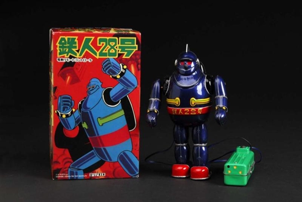 TIN T-28 ROBOT WIND-UP TOY.                       