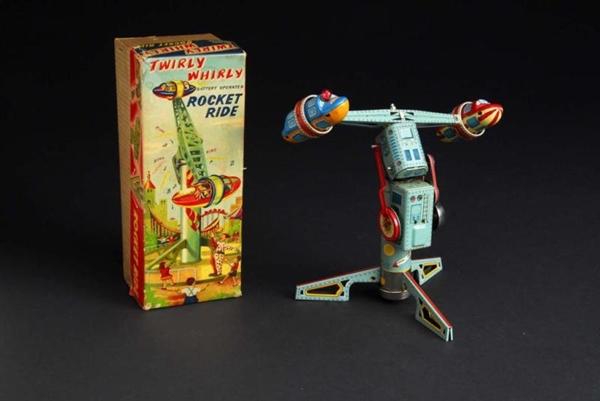 TIN TWIRLY WHIRLY ROCKET RIDE BATTERY-OP TOY.     
