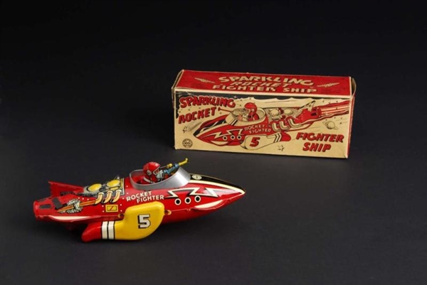 TIN MARX NO. 5 ROCKET FIGHTER WIND-UP TOY.        