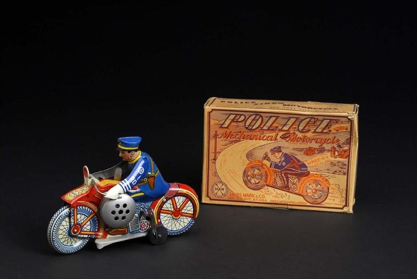 TIN MARX POLICE MOTORCYCLE WIND-UP TOY.           