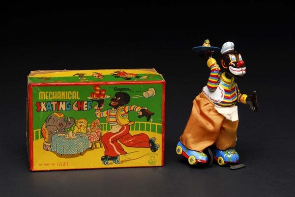 TIN TPS BLACK SKATING CHEF WIND-UP TOY.           