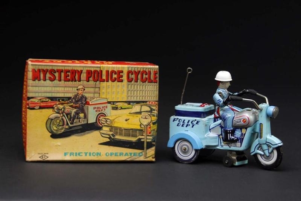 TIN MYSTERY POLICE MOTORCYCLE FRICTION TOY.       