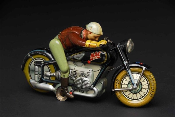 TIN MAC 700 MOTORCYCLE WIND-UP TOY.               