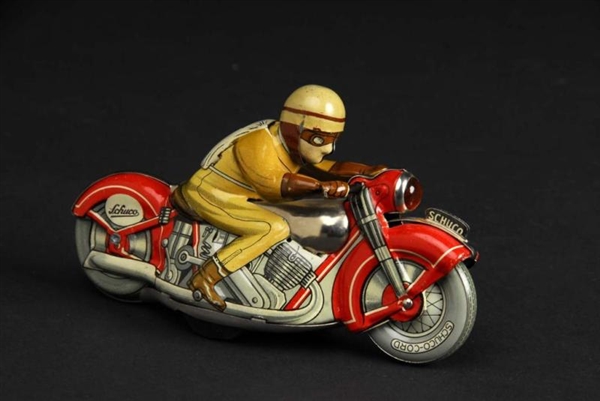 TIN SCHUCO NO. 6 MOTORCYCLE WIND-UP TOY.          