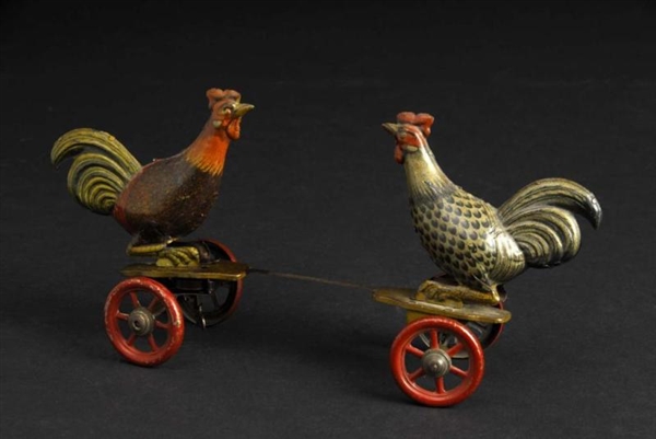 TIN ROOSTER FIGHTING WIND-UP TOY.                 