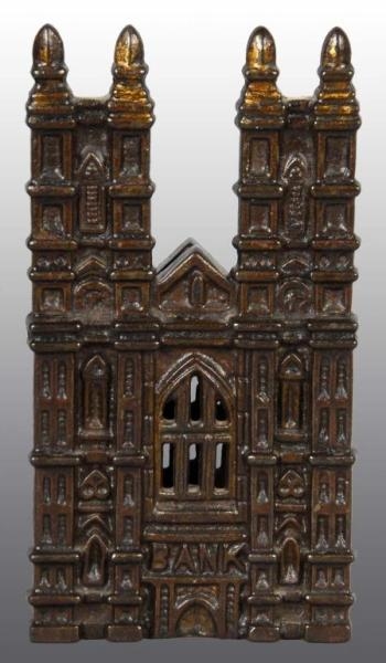 CAST IRON CATHEDRAL STILL BANK.                   