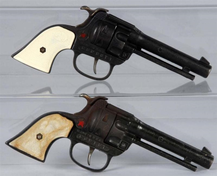 LOT OF 2: CAST IRON HUBLEY COWBOY CAP GUNS.       