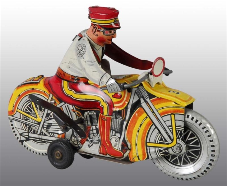 TIN MARX POLICEMAN MOTORCYCLE WIND-UP TOY.        