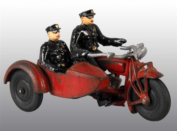 CAST IRON HUBLEY MOTORCYCLE WITH SIDECAR TOY.     