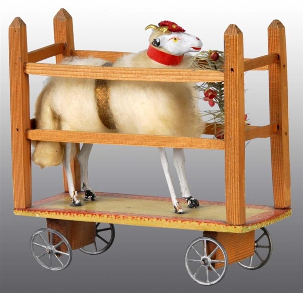 RAM PULL TOY IN WOODEN CAGE.                      