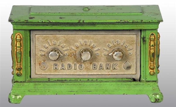 CAST IRON RADIO STILL BANK.                       