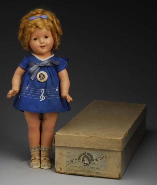 BOXED IDEAL COMPOSITION SHIRLEY TEMPLE DOLL.      