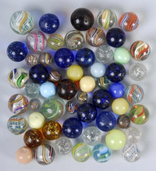 LOT OF 57: ASSORTED HANDMADE MARBLES.             