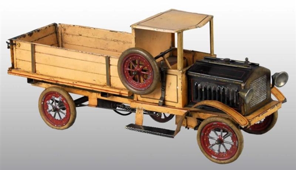 TIN DOLL COMPANY LIVE STEAM TRUCK TOY.            