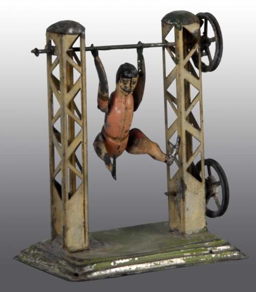 TIN HAND-PAINTED ACROBAT STEAM ACCESSORY TOY.     
