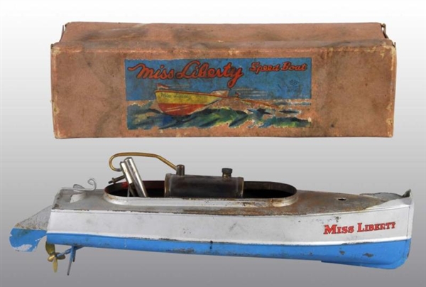 TIN "MISS LIBERTY" LIVE STEAM SPEED BOAT TOY.     