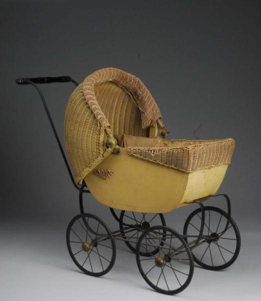 WICKER BABY DOLL CARRIAGE.                        