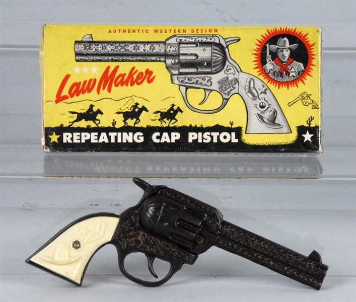 CAST IRON KENTON LAWMAKER CAP GUN.                