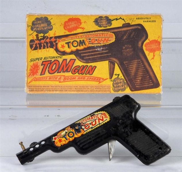 SUPER AUTOMATIC TOM GUN.                          