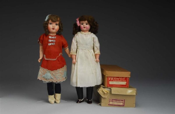 LOT OF 2: BOXED DOLLS.                            