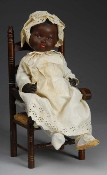 BLACK BISQUE CHARACTER BABY DOLL.                 