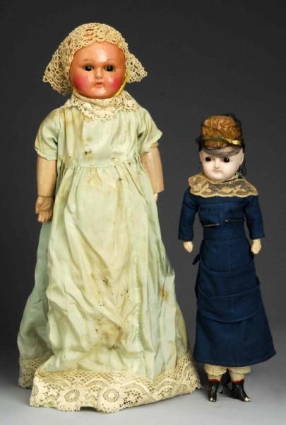 LOT OF 2: EARLY WAX OVER PAPIER-MACHE DOLLS.      