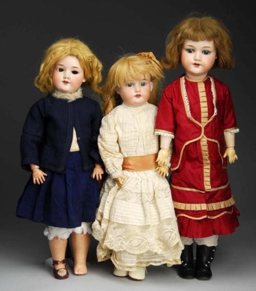 LOT OF 3: LARGE BISQUE DOLLS.                     