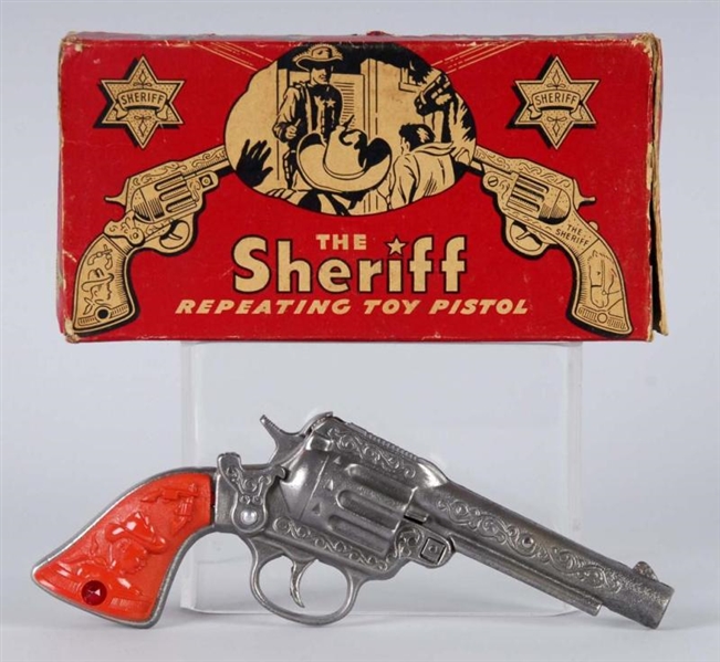 THE SHERIFF CAP GUN.                              