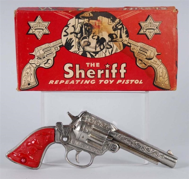 THE SHERIFF CAP GUN.                              