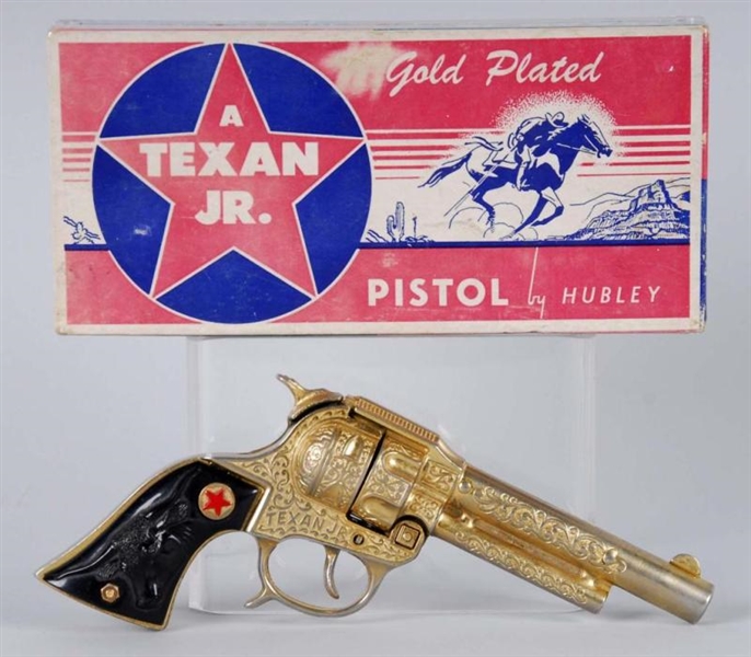 GOLD TEXAN JR. HUBLEY CAP GUN.                    