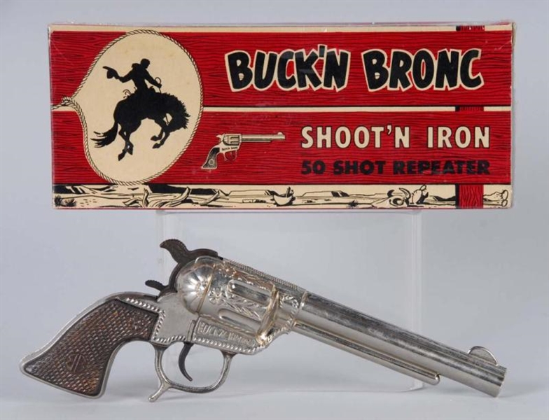 BUCK-N-BRONC CAP GUN.                             