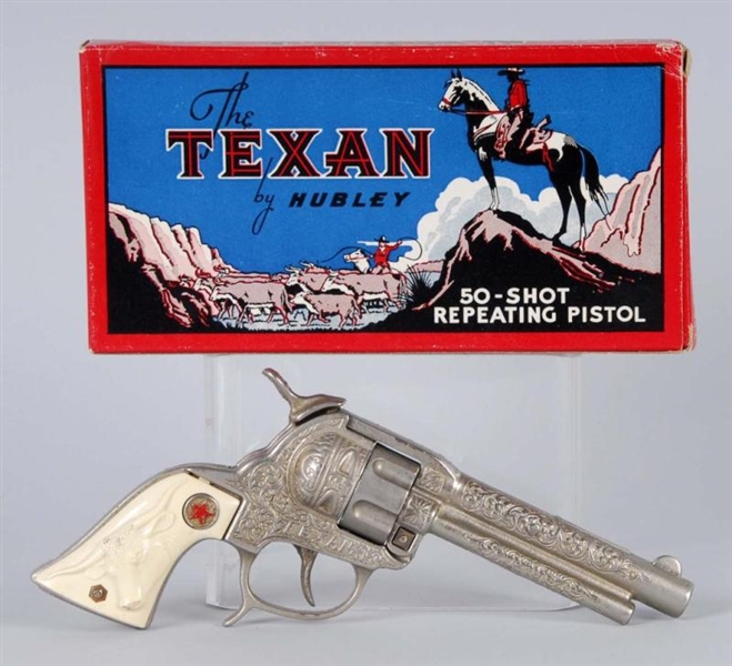 CAST IRON TEXAN HUBLEY CAP GUN.                   