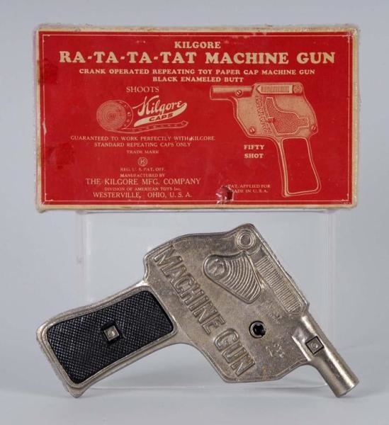 CAST IRON KILGORE RA-TA-TA-TAT MACHINE GUN.       