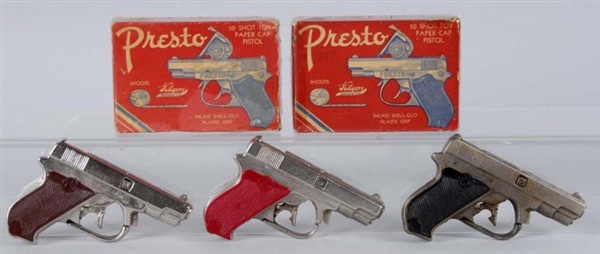LOT OF 3: CAST IRON PRESTO CAP GUNS.              