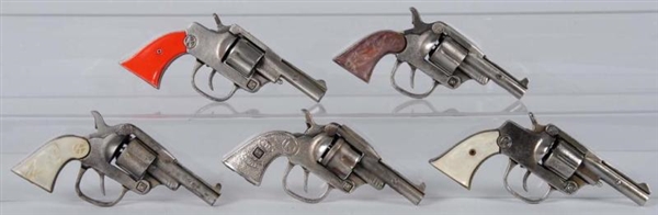 LOT OF 5: CAST IRON SIX-SHOOTER CAP GUNS.         