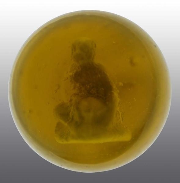 SULPHIDE AMBER SEATED MONKEY MARBLE.              