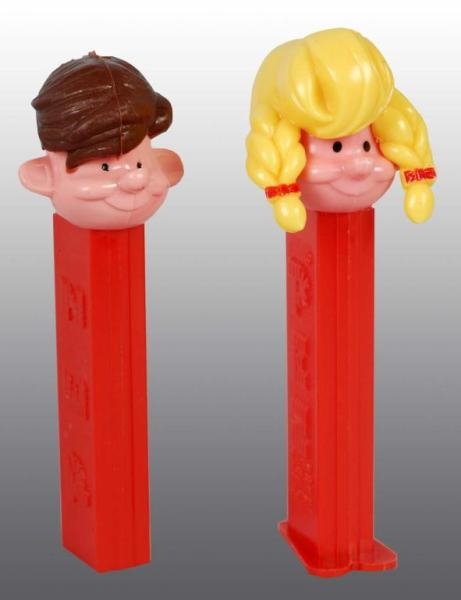 BOY AND GIRL PEZ DISPENSERS.                      