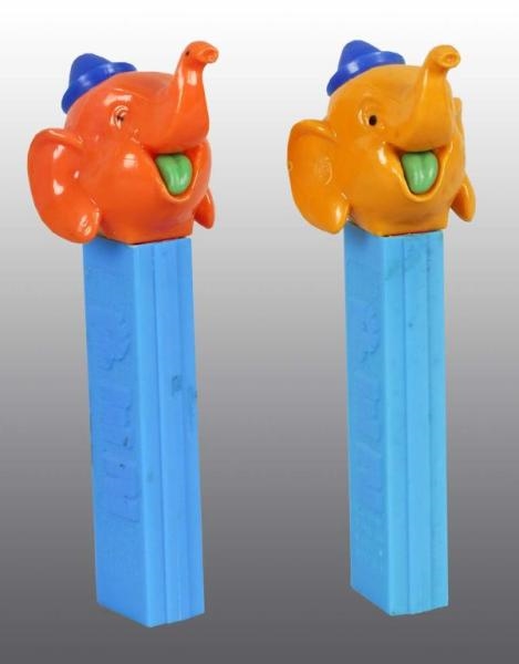 LOT OF 2: ELEPHANTS WITH HATS PEZ DISPENSERS.     