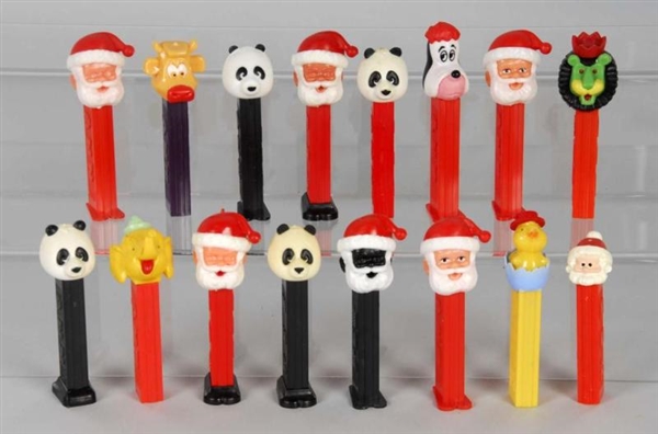 LOT OF 16: ASSORTED PEZ DISPENSERS.               