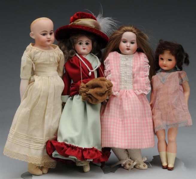 LOT OF 4: BISQUE DOLLS.                           