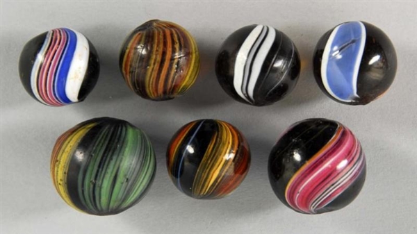 LOT OF 7: INDIAN SWIRL MARBLES.                   