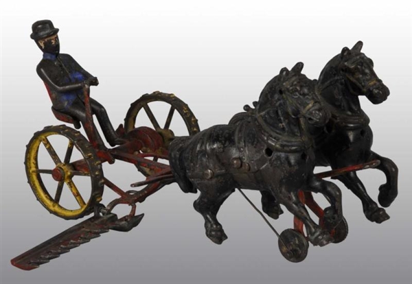 CAST IRON WILKINS HAY CUTTER HORSE-DRAWN TOY.     