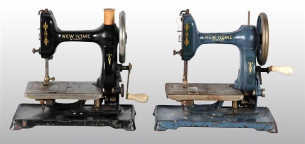 LOT OF 2: METAL NEW HOME MIDGET SEWING MACHINES.  