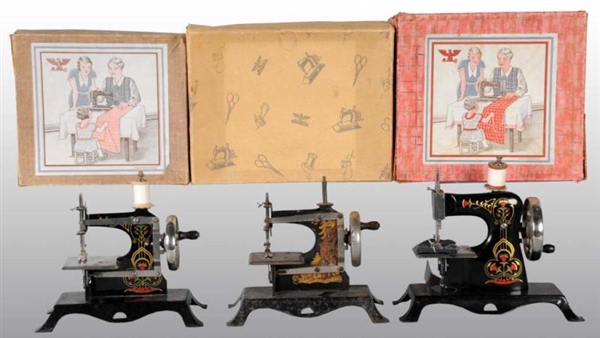 LOT OF 3: METAL CHILDS TOY SEWING MACHINES.      