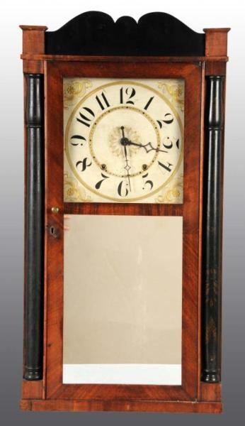 WOODEN SHELF CLOCK WITH PAINTED COLUMNS.          