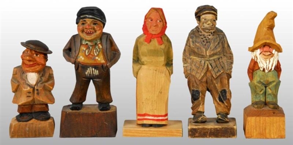 LOT OF 5: CARVED WOODEN FIGURES.                  