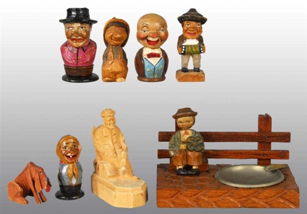 LOT OF 8: WOODEN CARVED FIGURES.                  