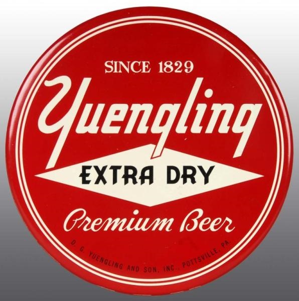 TIN YUENGLINGS EXTRA DRY BEER DISC SIGN.         