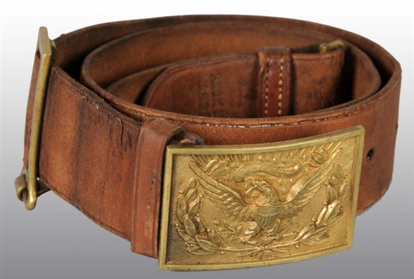 ANTIQUE LEATHER BELT WITH BRASS EAGLE BUCKLE.     