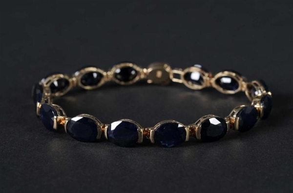 GOLD BRACELET WITH SAPPHIRES.                     